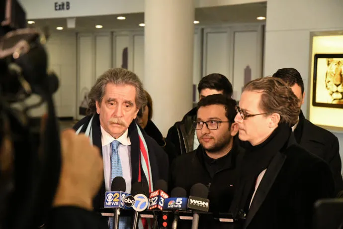 people talking to news reporters