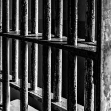 Jail cell bars.