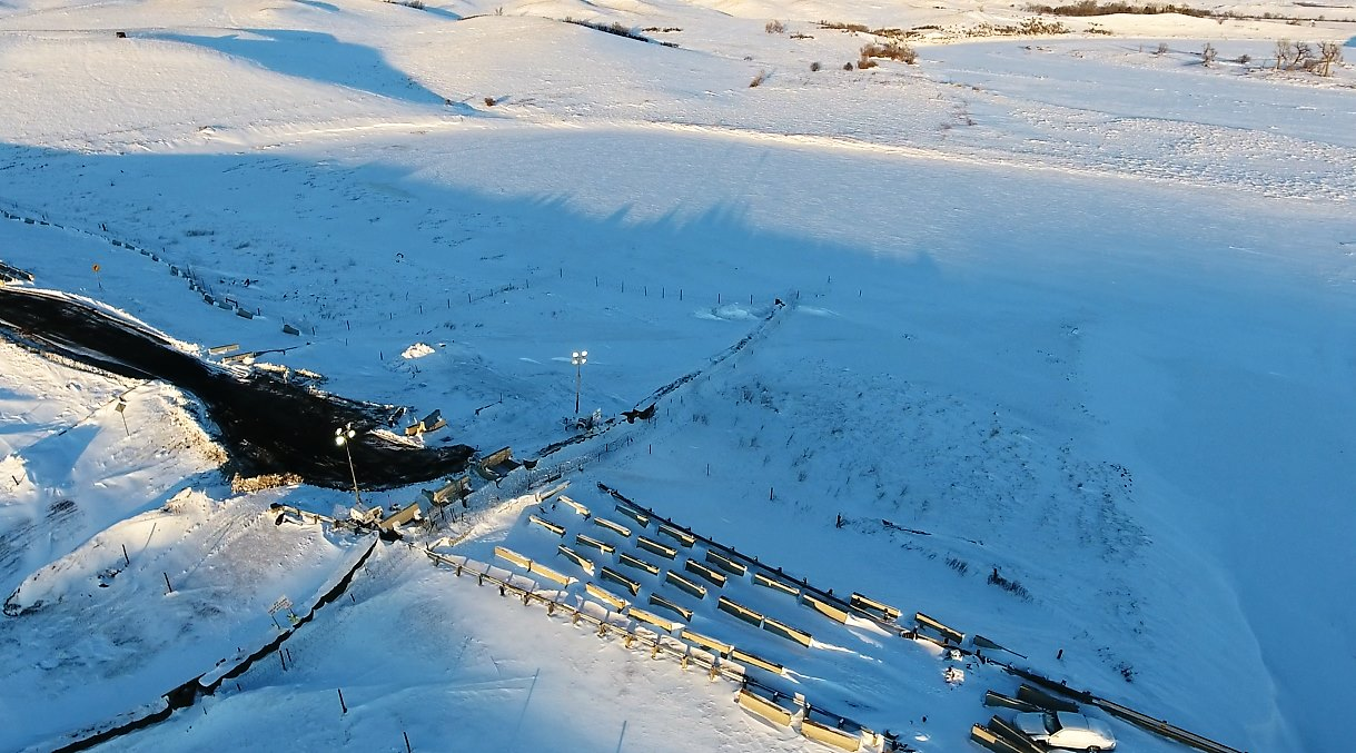 Aerial view of snow covered highway 1806